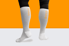 Gym Socks - White with Orange Writing - GetSocked!